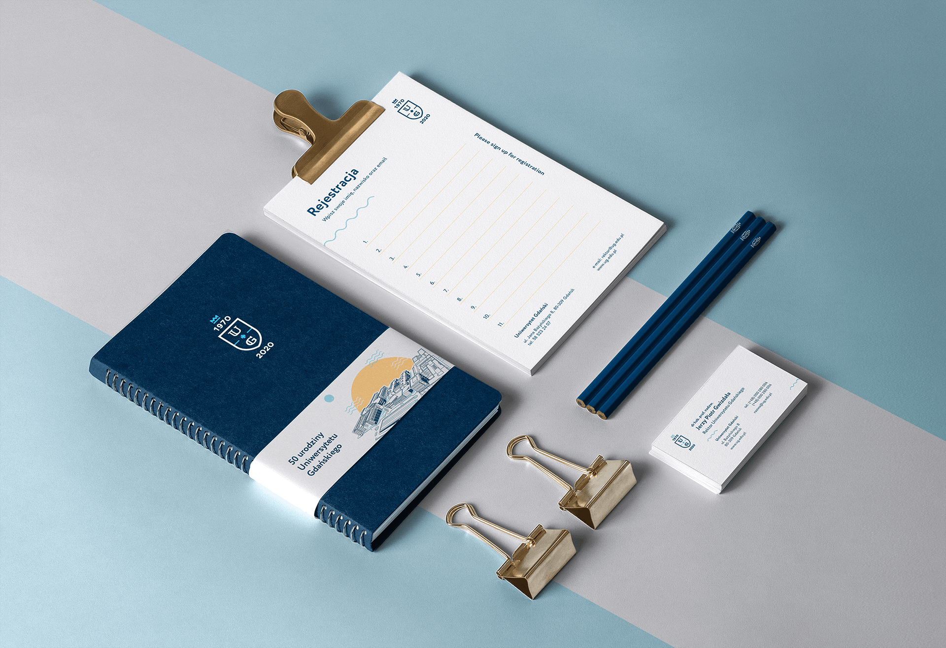 The illustrations applied to a branded notebook, notepad and business cards