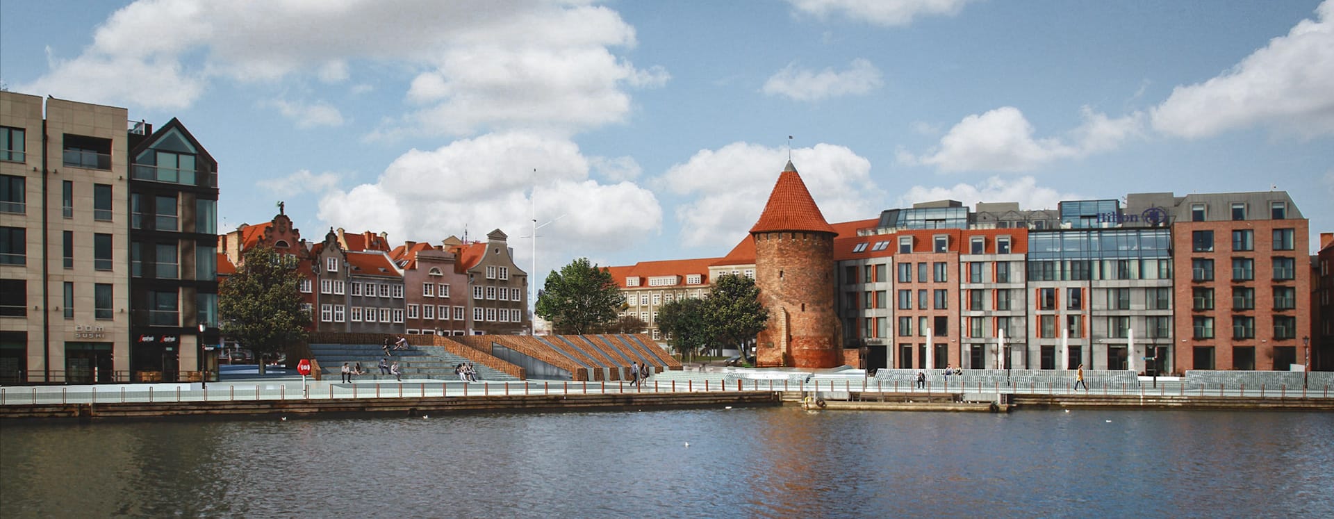 Panorama across the Motlawa: waterfront amphitheatre steps, historic brick tower and townhouses along the promenade