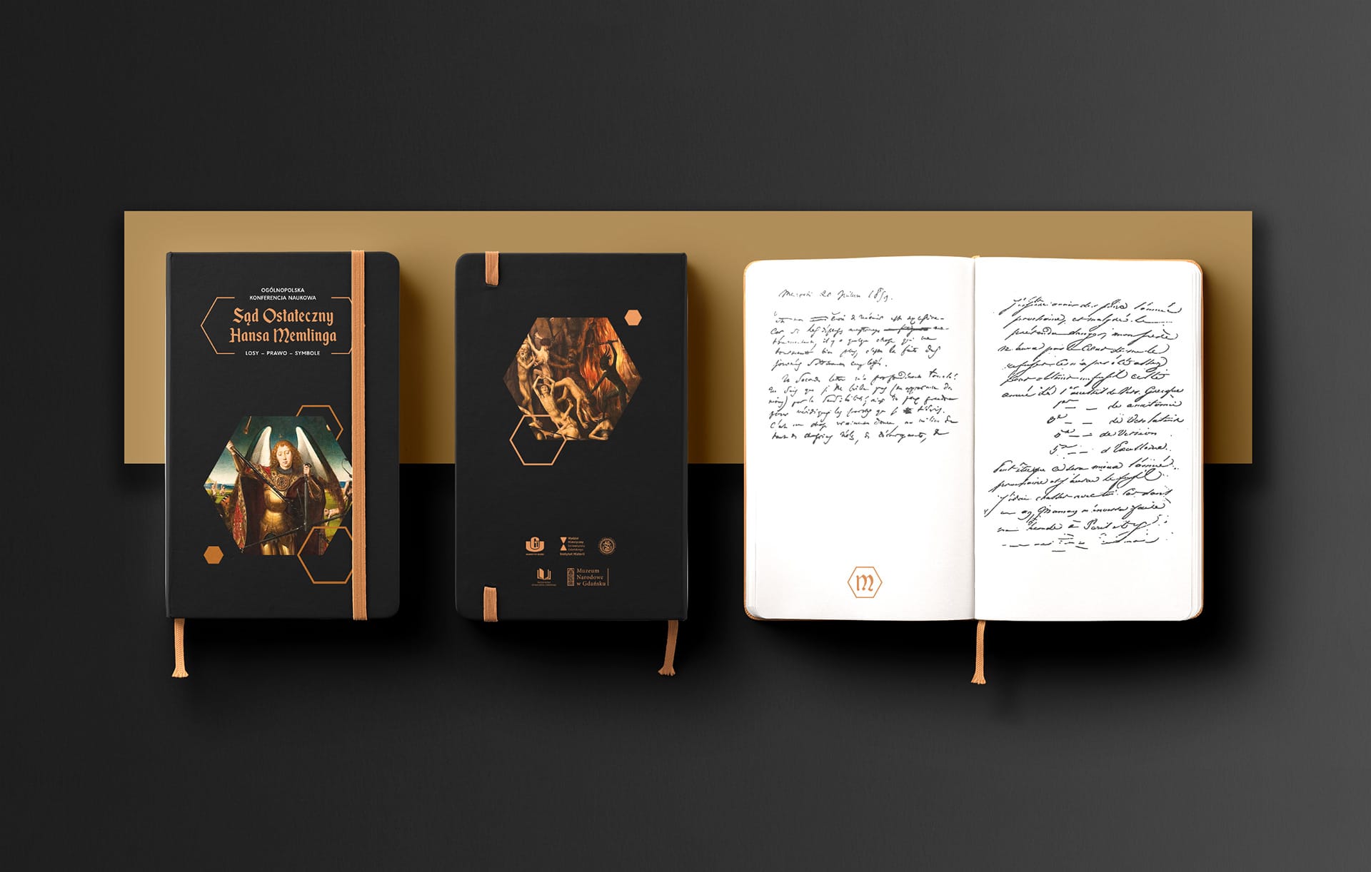 Two branded black notebooks, front and back, beside an open notebook filled with historical handwriting