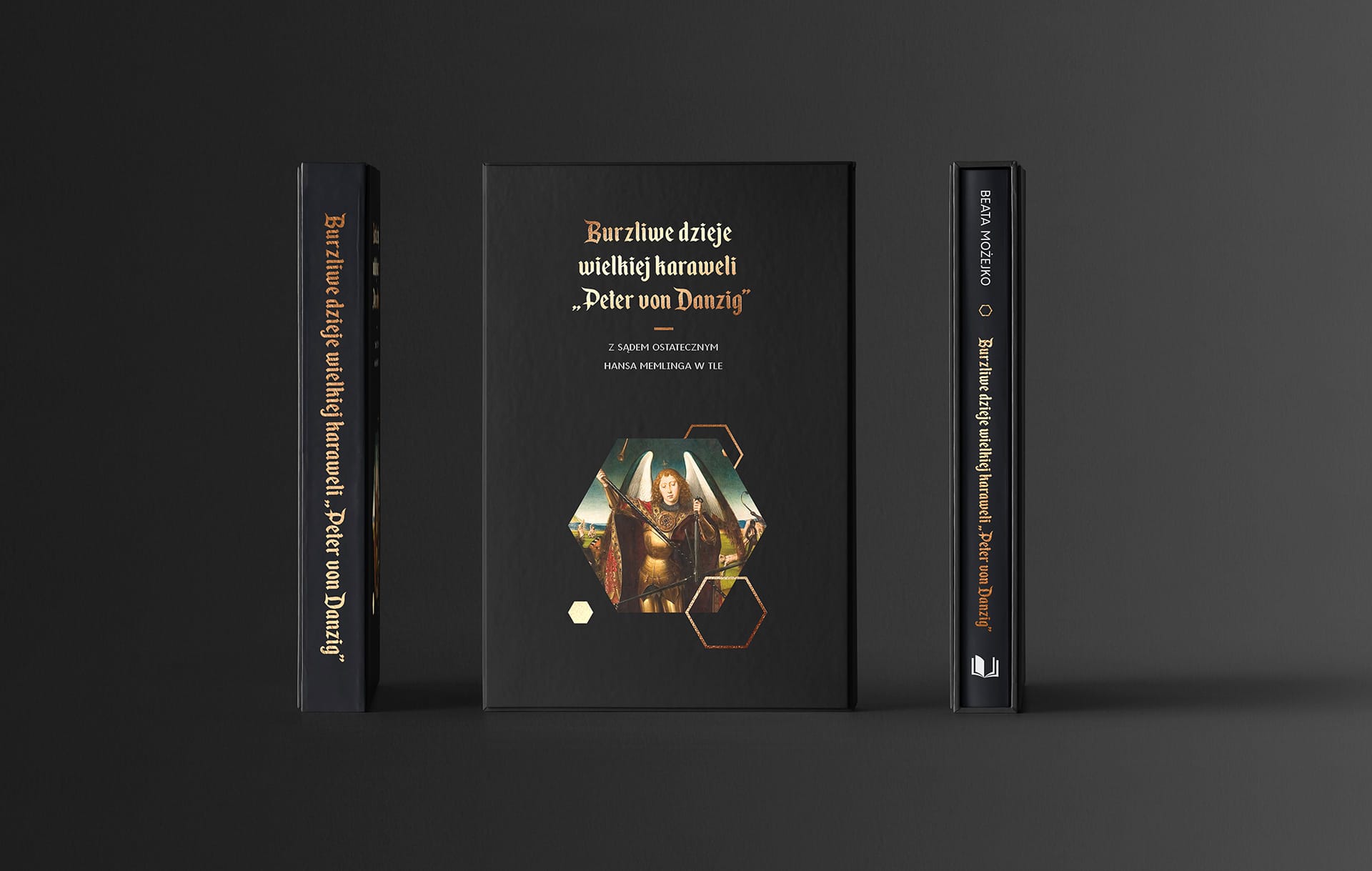 Book "Peter von Danzig" shown front cover and both spines, black with gold blackletter title and the Memling archangel in a hexagon