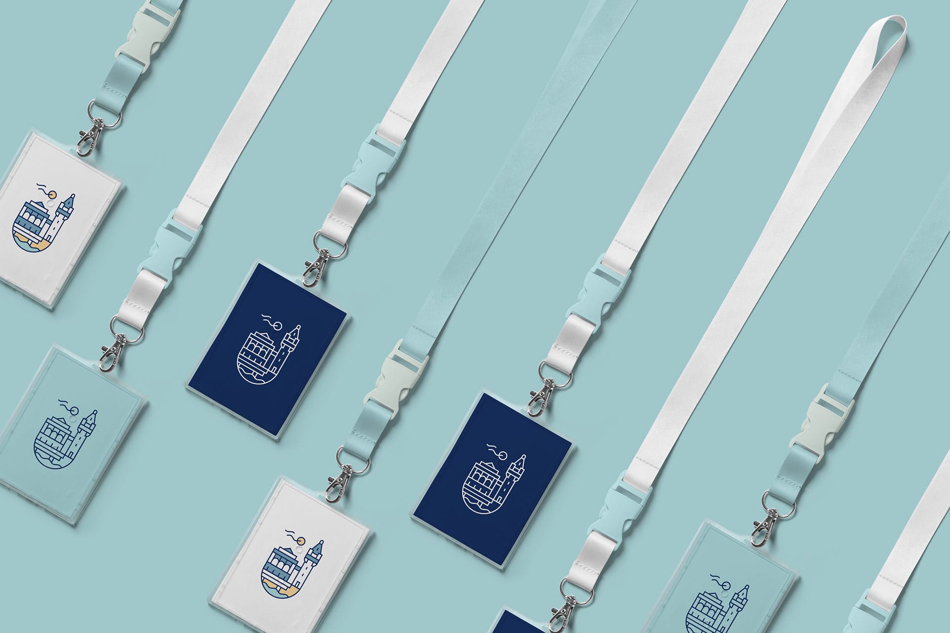 Branded lanyards and ID card holders featuring the Sopocka logo in navy and white